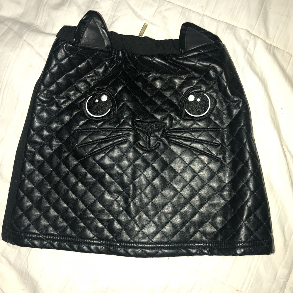 Cat face black skirt